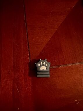 CROCS Black and White Paw Print Jibbitz Charm